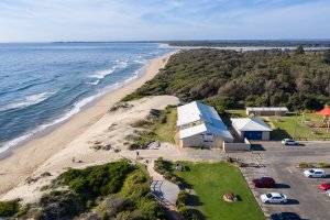 Shoalhaven Heads Surf Life Saving Club overhead shot showing the hall and beach